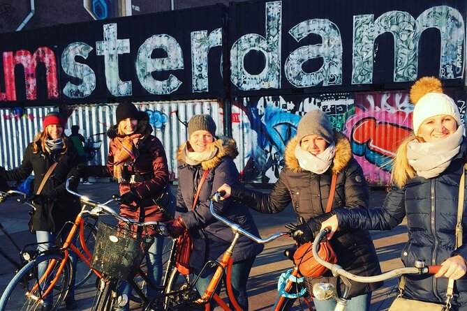 Amsterdam's Hidden Gems and Street Art Bike Tour - NDSM Wharf: cranes, ship halls, and street art