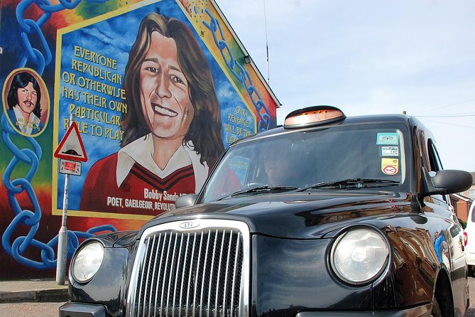 Belfast Famous Black Taxi Tour Political Murals & Peace Wall 2 Hr - Divis and the International Wall: starting with Belfast’s divided story
