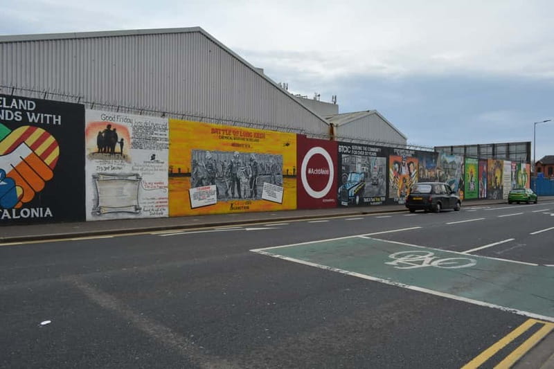 Belfast: Famous Murals Private Tour - The Peace Walls and a meaningful signature