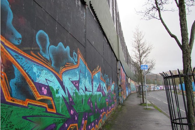 Belfast: Murals Taxi Tour - At the Peace Wall, the politics become physical