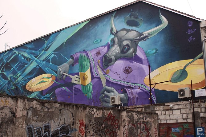 Budapest Urban Art - Private Street Art Tour with a Drink in a Ruin Bar - Designer shops, vintage finds, and pop-up spaces