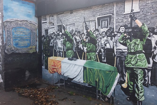 IRA Troubles Conflict Private Tour Museum Graves Murals and Political Analysis - The peace walls, where separation is still visible
