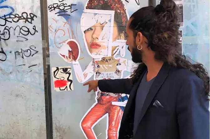 Kickstart Street Art Tour in Lisbon - The Shepard Fairey and Vhils work in Graça