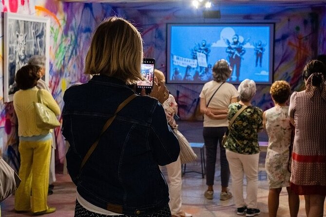 Lisbon Banksy Museum Admission Ticket - Murals, canvases, projections, and video installations