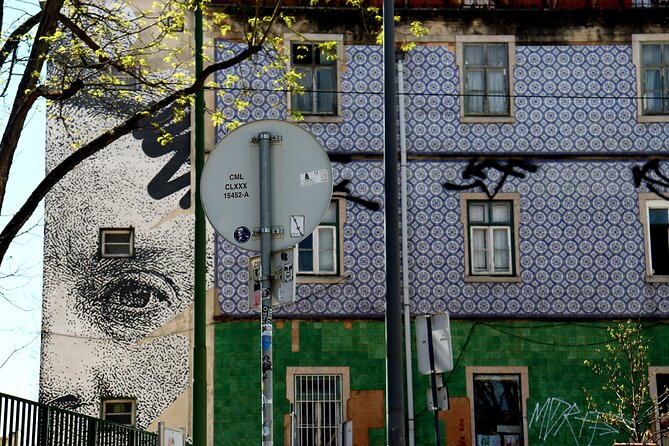 Lisbon Street Art and Lookout Point Tour - Roman remains and a modern outer wall