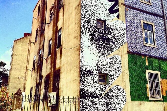 Lisbon Street Art - Private Guided Tour in a Electric Tuk Tuk - Portas do Sol and the painted story of Lisbon