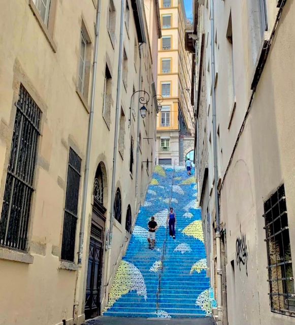 Lyon: Street Art & Street Food Tour - Walking from Croix-Rousse toward the peninsula