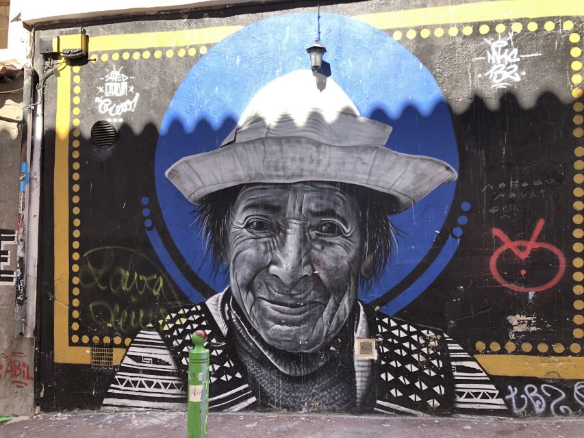 Marseille: Street Art Walking Tour and Local Drink - Small buildings, shutters, and laundry in the sun