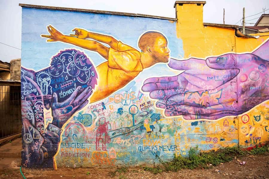 Nairobi: Kibera Street Art Tour with Local Artists - Walking through Kibera with local artists