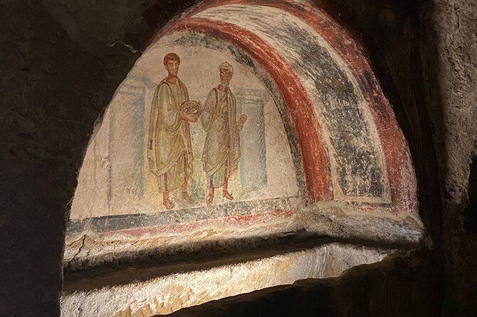Naples Murals Catacombs and Folklore Sanità District Tour - Inside the Catacombe di San Gennaro