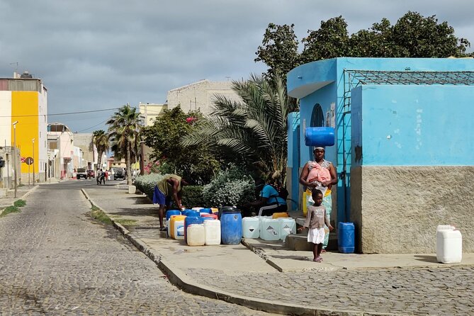 Sal island: Private Santa Maria City Tour, Street Art and Tapas - Old photographs, household objects, and the view over town