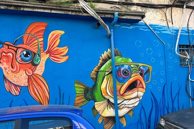 Tirana Mural Bike Tour: Street Art, Culture & Photography Stops - Franko Dine’s Brothers and the final message