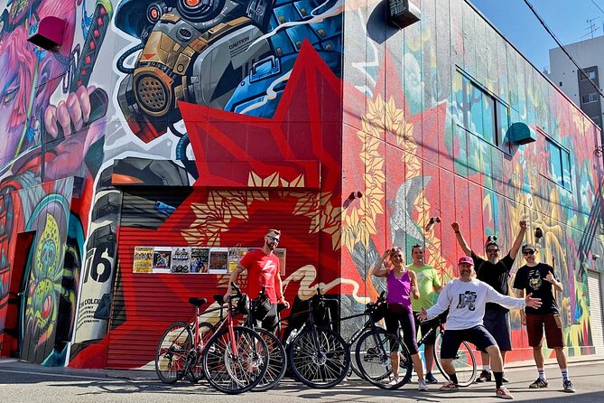 Urban Canvas: Osaka Street Art Bike Tour - Across the Yodo River to Juso